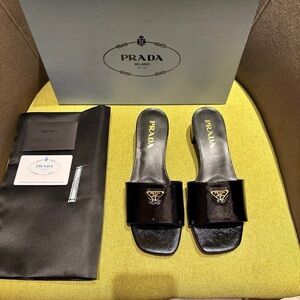 Prada Black Patent Leather Slide Mules with Gold Logo